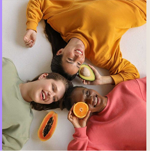 Three friends laughing together, representing PowerCare's community